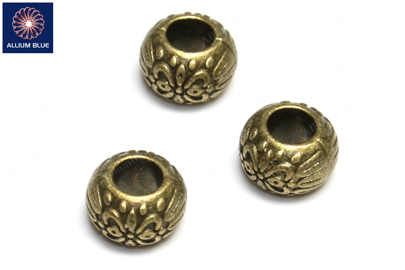 Round Pattern Bead, Plated Base Metal, Antique Brass, 10 x 7mm - Click Image to Close